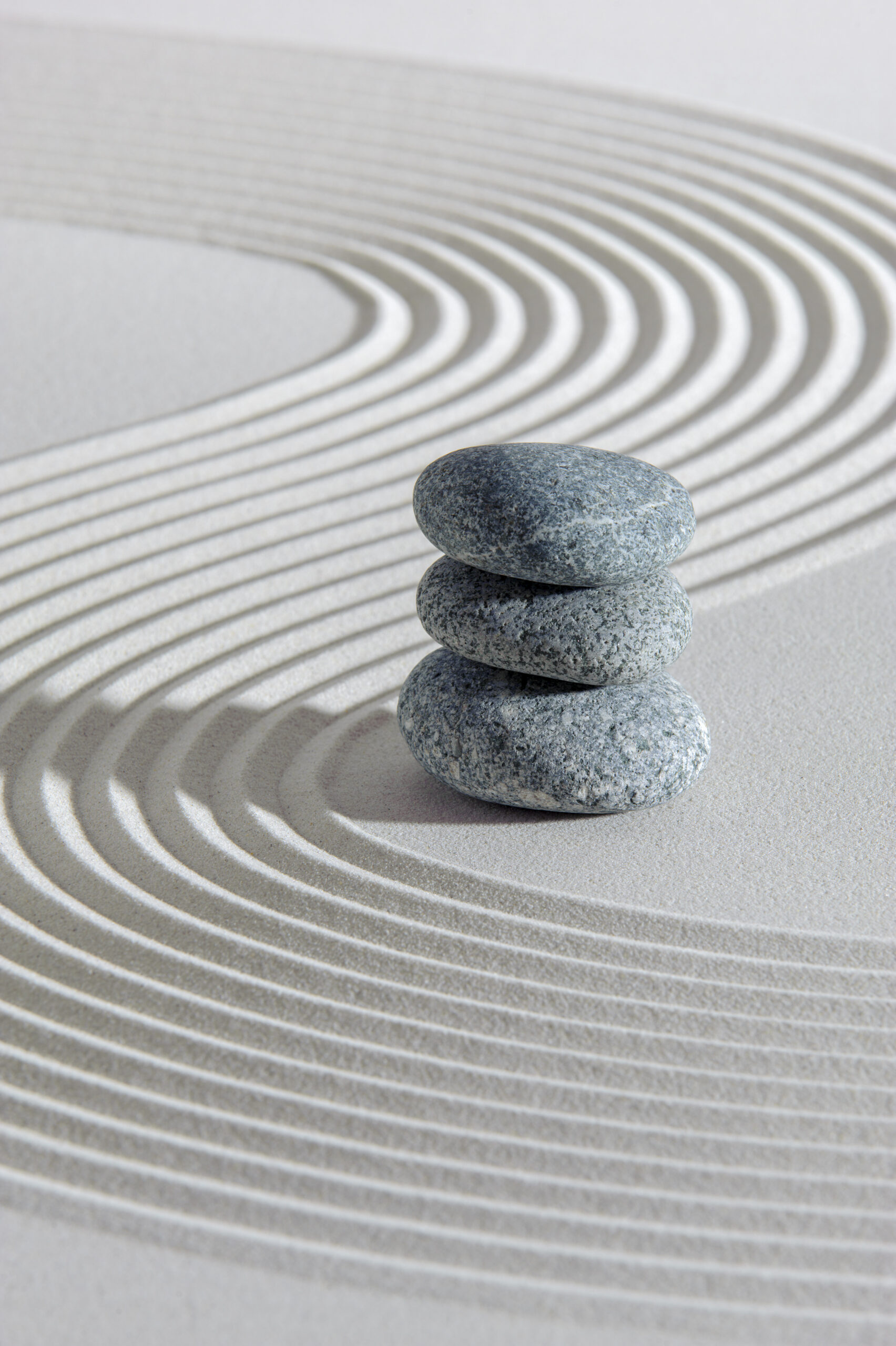 textured sand and stone in Japanese zen garden